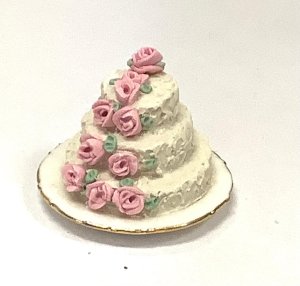 Wedding Cake with a Cascade of Pink Roses