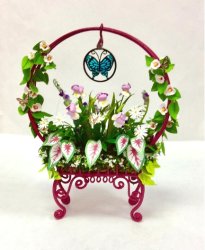 Pink Arched Planter with Assortment of Flowers
