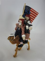 Rag Dolls Riding a Camel